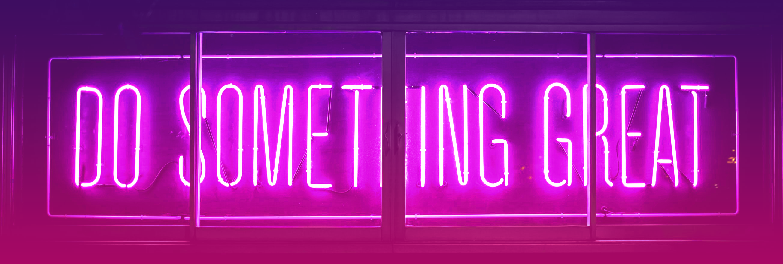 neon lights saying 'do something great'